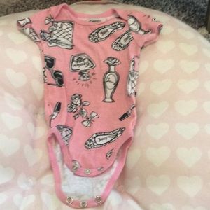 Retro design Juicy Couture onesie.